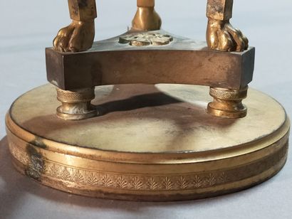 
Pair of gilt bronze cups supported by sphinxes...