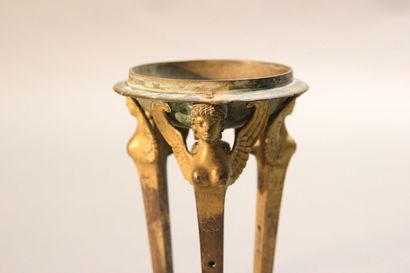 
Pair of gilt bronze cups supported by sphinxes...