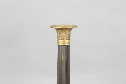 Pair of candelabras with four lights in chased,...