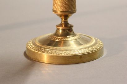 Pair of ormolu and chased bronze torches....
