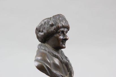 Pair of patinated bronze desk busts representing...