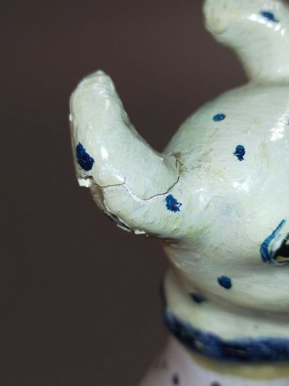 Pair of seated dalmatians in polychrome earthenware.

Rectangular...