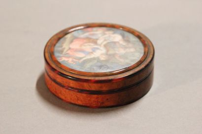 Small circular box in tortoiseshell and burr...