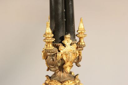 Pair of bronze and black marble candlesticks...