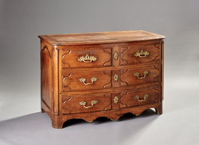 Molded walnut chest of drawers of slightly...