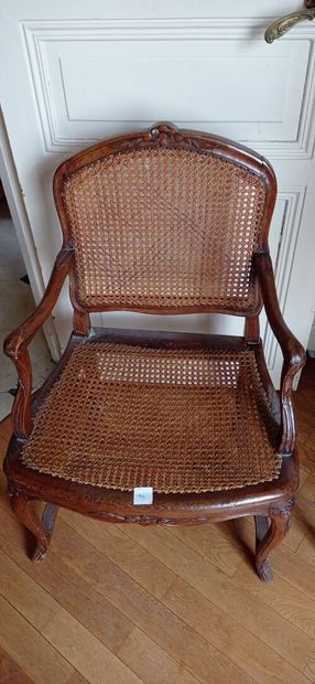 Armchair in natural wood molded and carved...