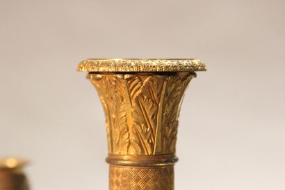 Small chandelier in gilded and chased bronze.

With...