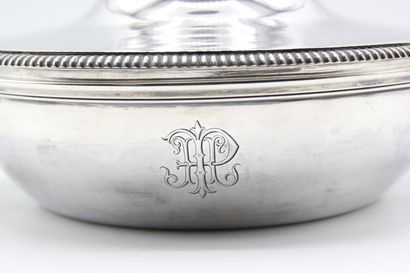 Silver covered vegetable dish.

Body and...