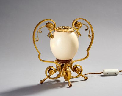 Night light in bronze and gilded brass decorated...