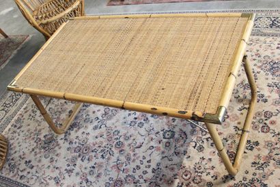Rattan coffee table.

Folding legs.

Woven...