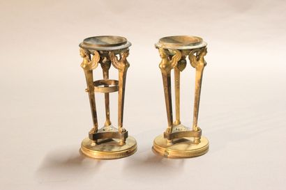 
Pair of gilt bronze cups supported by sphinxes...