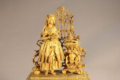 Clock in gilded and chased bronze.

The upper...