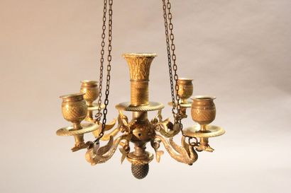Small chandelier in gilded and chased bronze.

With...