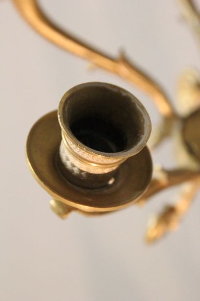 Pair of sconces with four lights in chased...