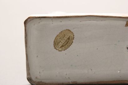 Pair of seated dalmatians in polychrome earthenware.

Rectangular...