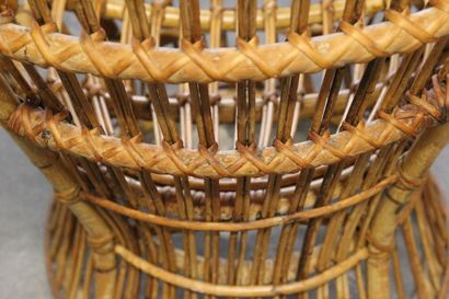 Pair of rattan armchairs.

The openwork back.

Circular...