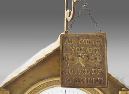 Talking clock in chased and gilded bronze....
