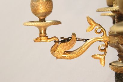 Small chandelier in gilded and chased bronze.

With...