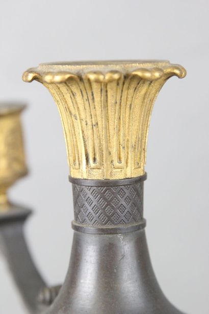 Pair of candelabras with four lights in chased,...