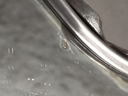 Table top in silver plated metal in two parts.

The...