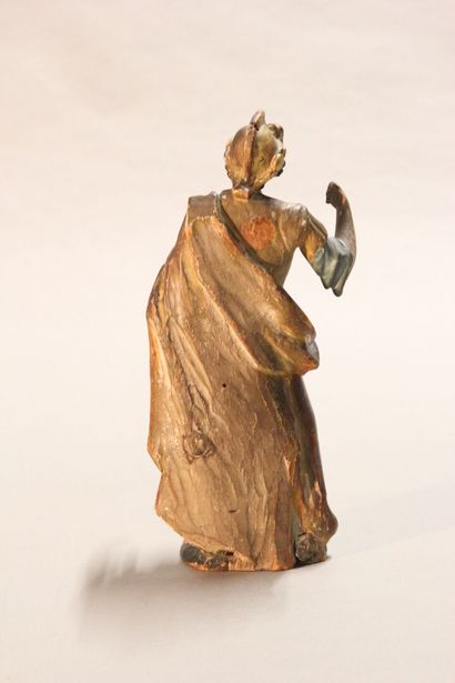 Antique soldier in armor.

Subject in polychromed...