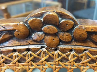 Armchair in natural wood molded and carved...