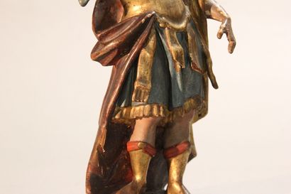 Antique soldier in armor.

Subject in polychromed...