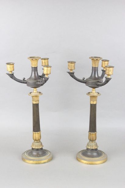 Pair of candelabras with four lights in chased,...