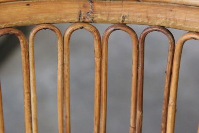 Pair of rattan armchairs.

The openwork back.

Circular...
