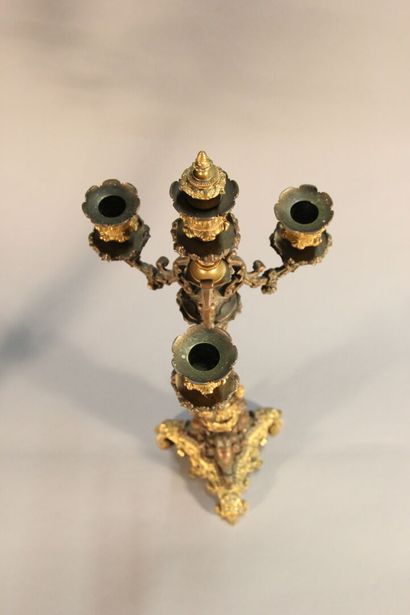 Pair of bronze and black marble candlesticks...