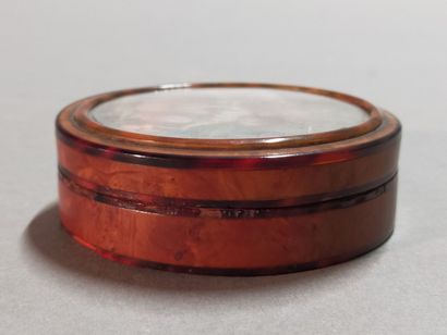 Small circular box in tortoiseshell and burr...