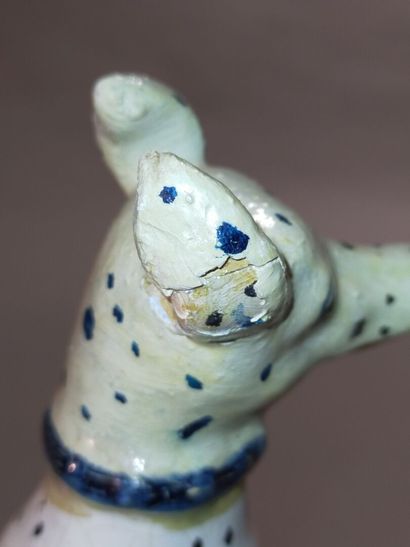 Pair of seated dalmatians in polychrome earthenware.

Rectangular...