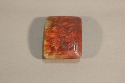 CHINA

Rust and spinach jade belt buckle.

Incised...