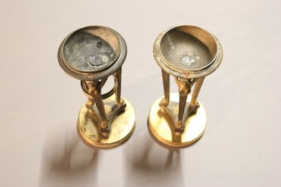 
Pair of gilt bronze cups supported by sphinxes...