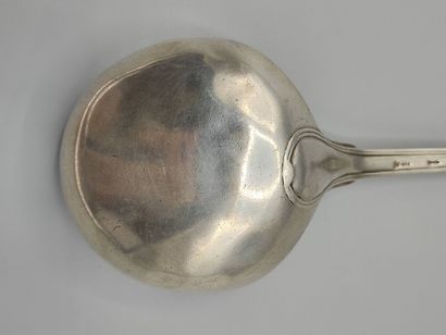 Silver ladle decorated with nets.

Dish of...