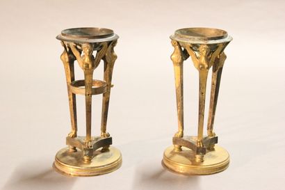 
Pair of gilt bronze cups supported by sphinxes...