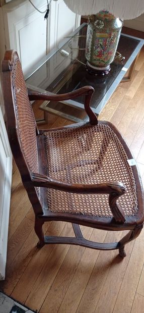 Armchair in natural wood molded and carved...