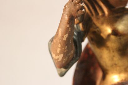 Antique soldier in armor.

Subject in polychromed...