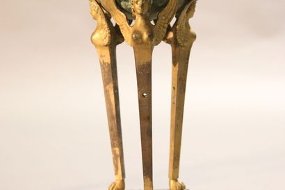 
Pair of gilt bronze cups supported by sphinxes...