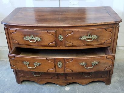 Molded walnut chest of drawers of slightly...