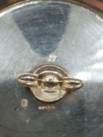 Silver covered vegetable dish.

Body and...