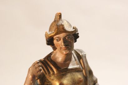 Antique soldier in armor.

Subject in polychromed...