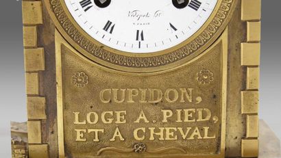 Talking clock in chased and gilded bronze....