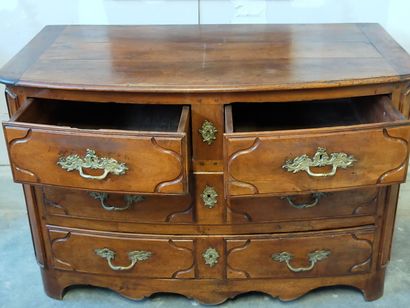 Molded walnut chest of drawers of slightly...