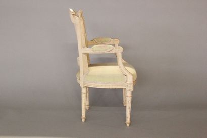 Child's armchair in carved wood and rechambered...