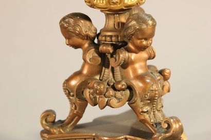 Pair of bronze and black marble candlesticks...
