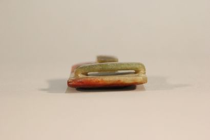 CHINA

Rust and spinach jade belt buckle.

Incised...