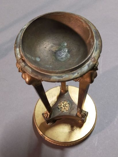 
Pair of gilt bronze cups supported by sphinxes...