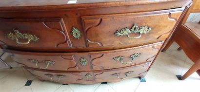 Molded walnut chest of drawers of slightly...