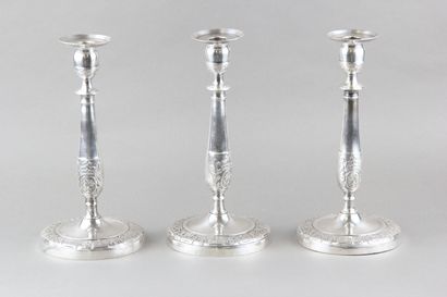 Suite of three candlesticks in silver plated...